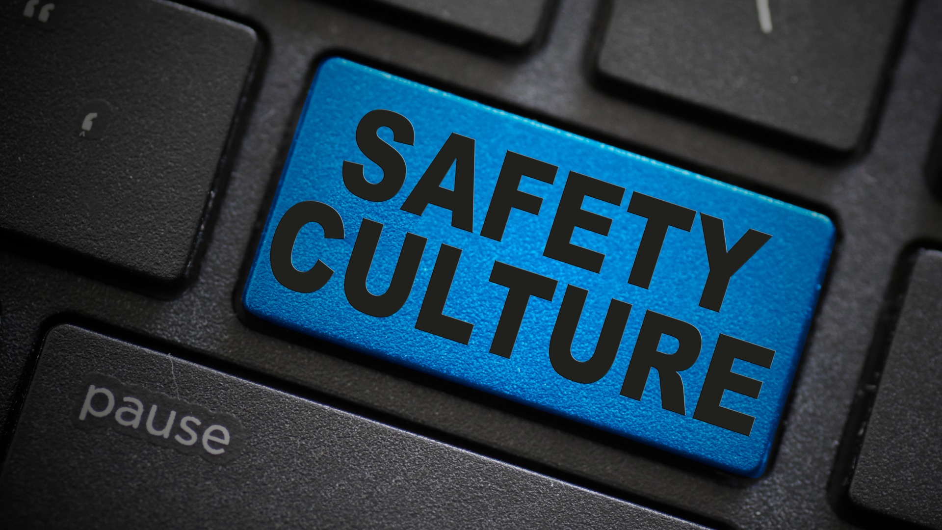 Close-up of a blue button on a computer keyboard that reads the words "Safety Culture" in capital letters.