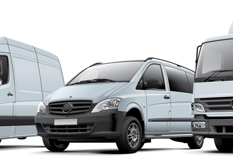 Three white diesel-powered vehicles: a van, an automobile, and a small truck, all lined up in a row on a white background.